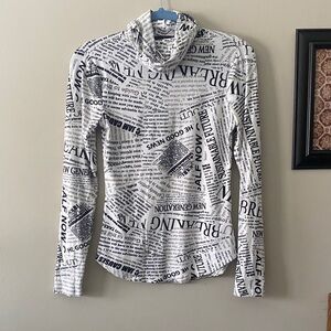 Almost Famous Black and White newspaper Text Print Long Sleeve Top